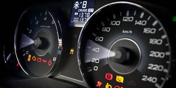 Speedometer and tachometer with dashboard control icons