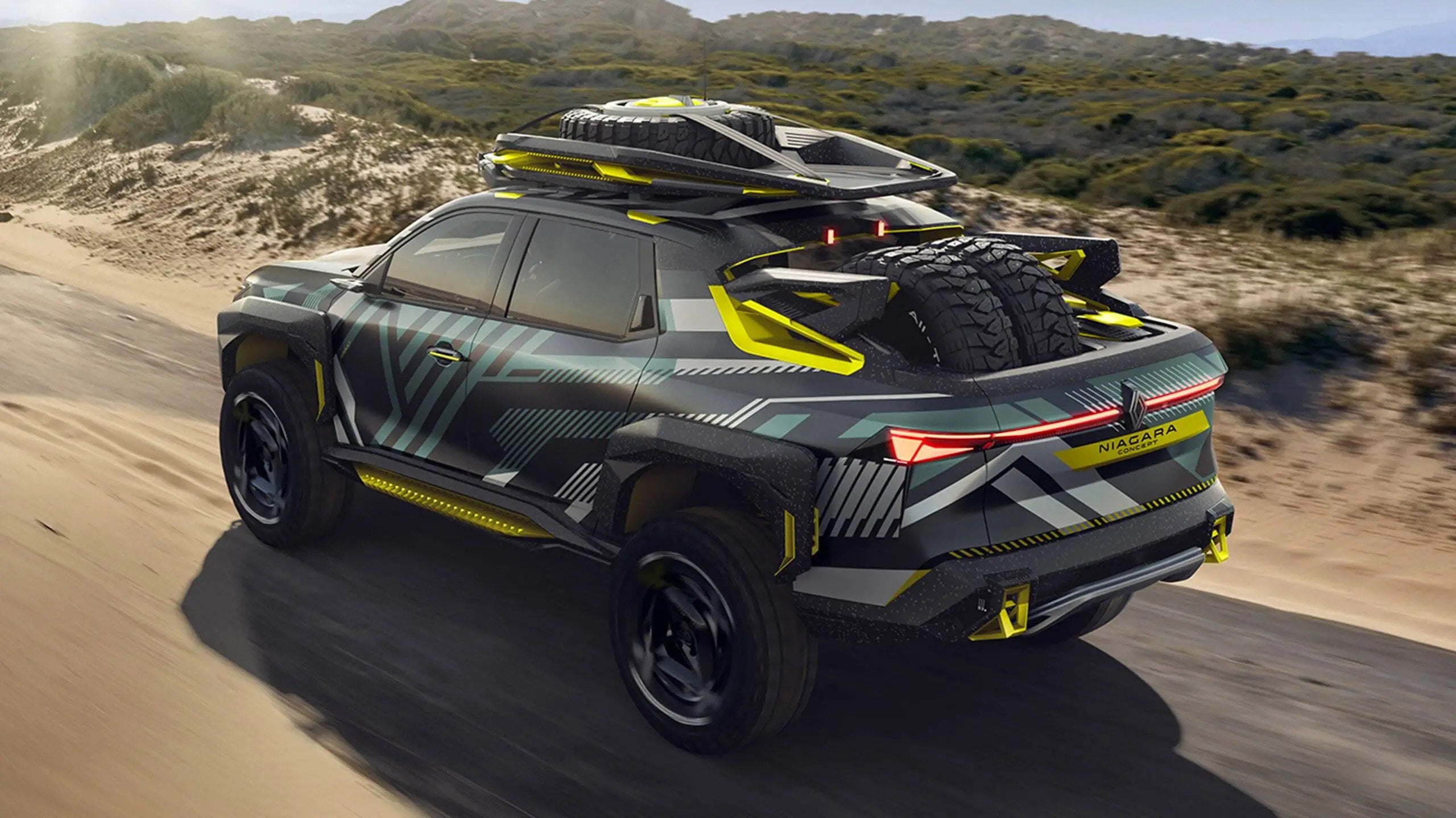 Renault Niagara Concept visto da dietro con ruota di scorta nel cassone e portapacchi da spedizione