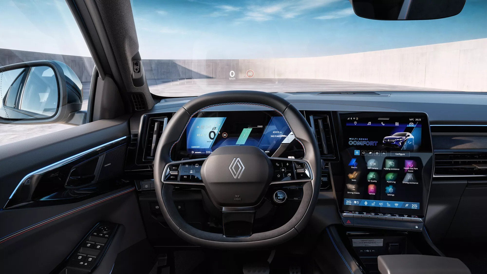 Interni della Renault Rafale hypnotic con cuciture blu, bianche e rosse e head-up display